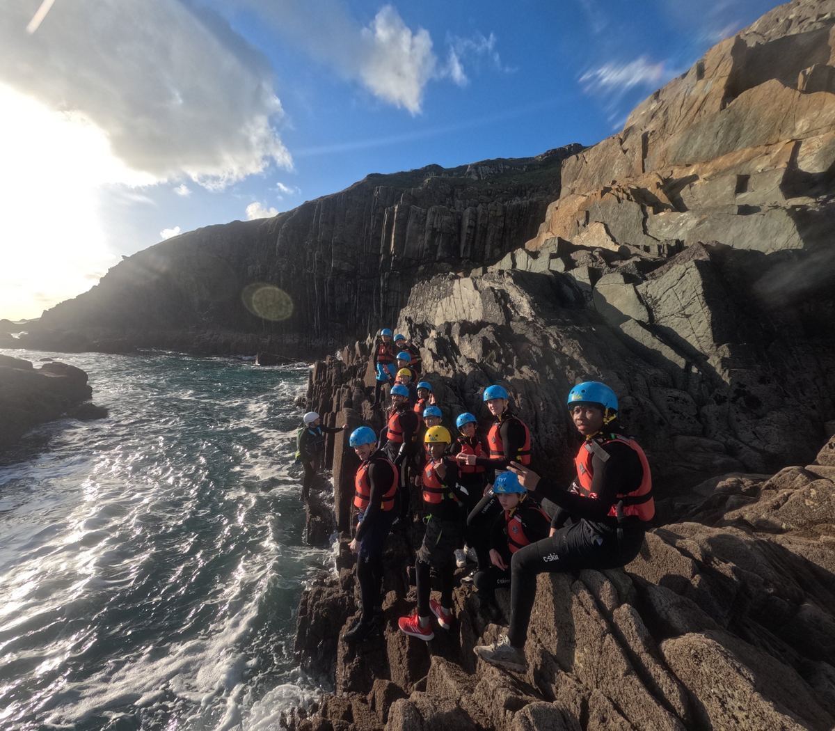 The whole group on the rocks